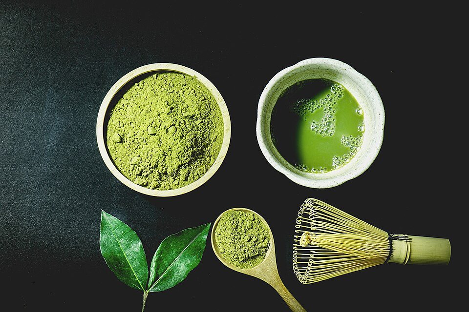 Matcha layout with leaf, tea, and powder